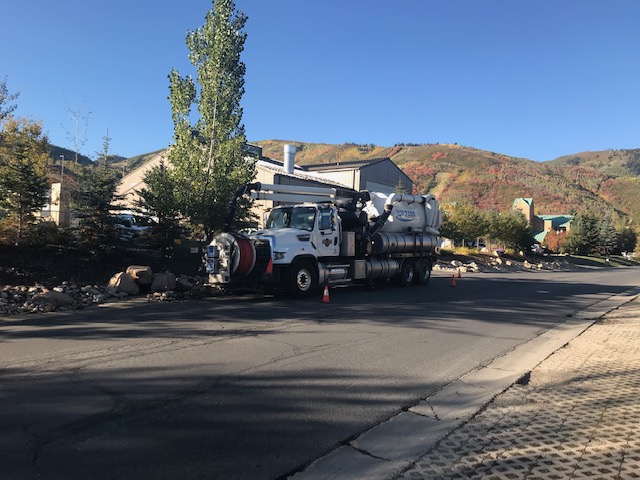 Vactor Truck parked on city street